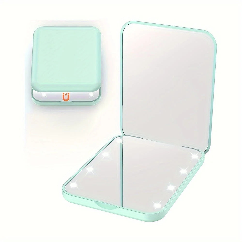 Pocket makeup mirror with LED light and dual magnification, featuring a compact design in stylish pink and green colors, perfect for on-the-go touch-ups and 4
