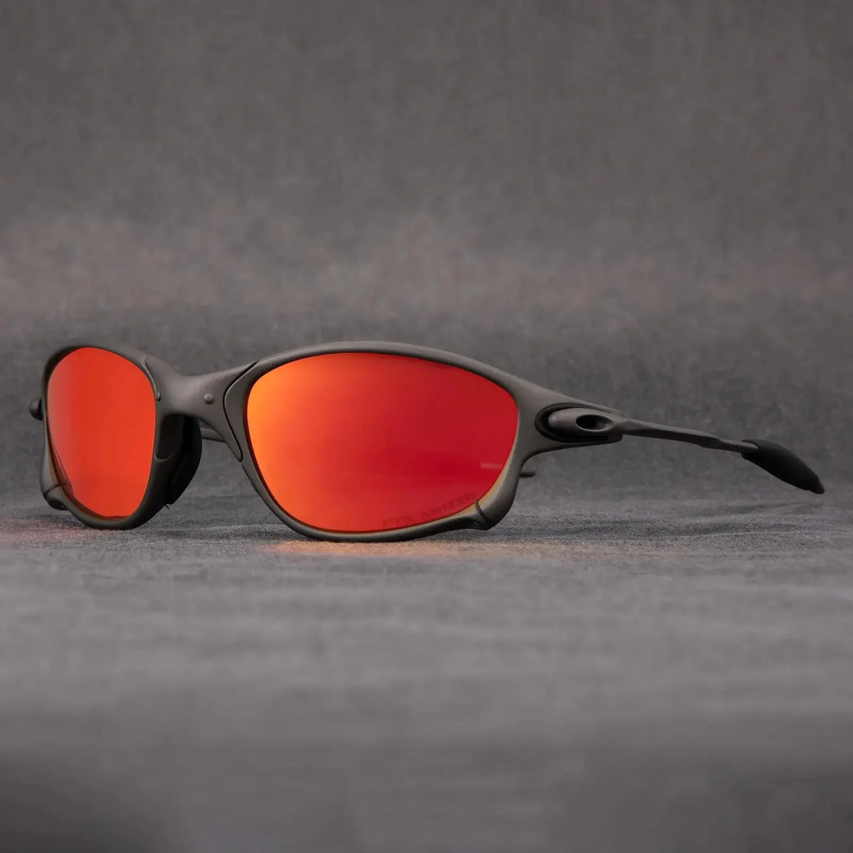 Polarized sports sunglasses featuring red mirrored lenses and UV400 protection, designed with a lightweight metal frame, ideal for cycling and outdoor activities. 5
