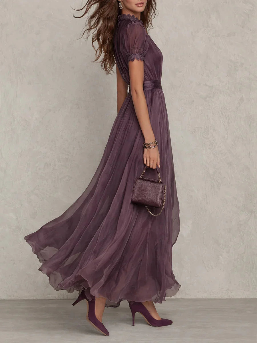 Purple maxi dress featuring a stylish cutout neck and elegant lace sleeves, perfect for formal evening events. 1