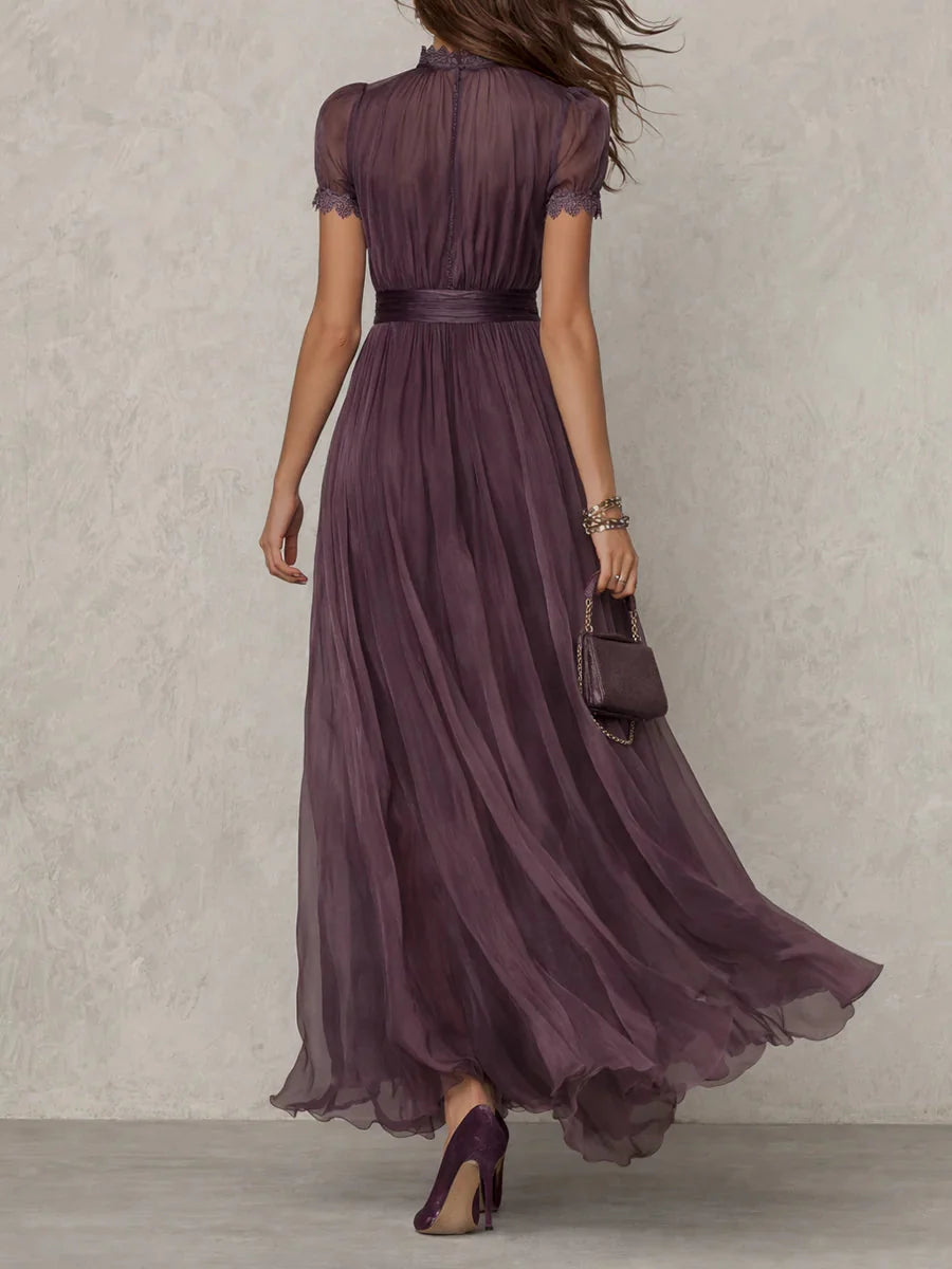 Purple maxi dress featuring a stylish cutout neck and elegant lace sleeves, perfect for formal evening events. 2