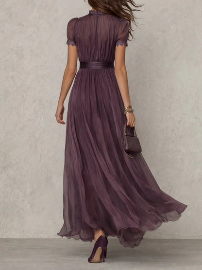 Purple maxi dress featuring a stylish cutout neck and elegant lace sleeves, perfect for formal evening events. 2
