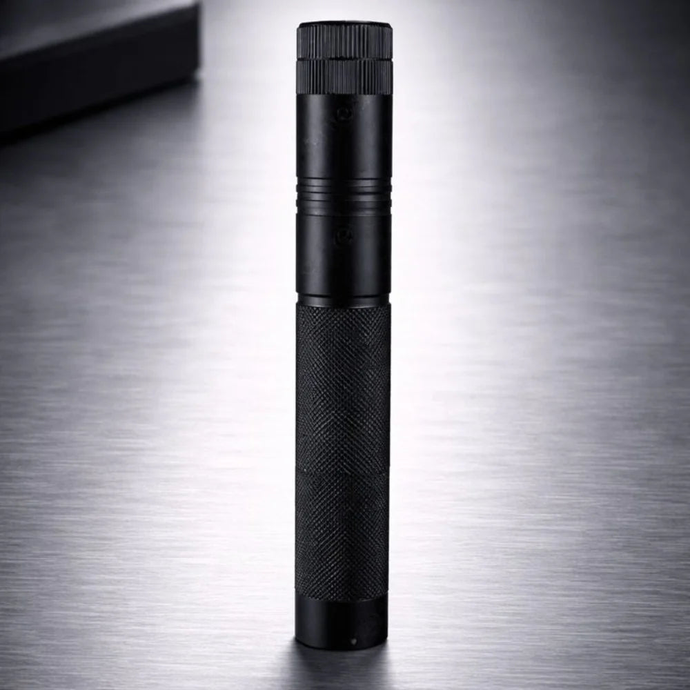Rechargeable laser pointer featuring adjustable focus and a safety lock, designed for long-range use and USB rechargeable for convenience. 2