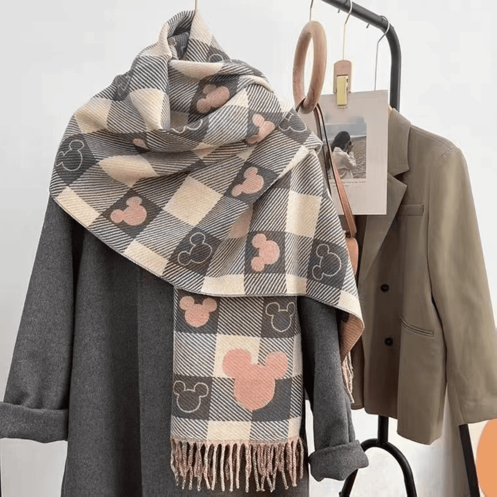 Reversible plaid scarf with tassels, featuring a lightweight and cozy design, made from a soft fabric blend, perfect for winter styling. 0