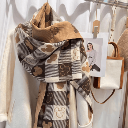 Reversible plaid scarf with tassels, featuring a lightweight and cozy design, made from a soft fabric blend, perfect for winter styling. 1