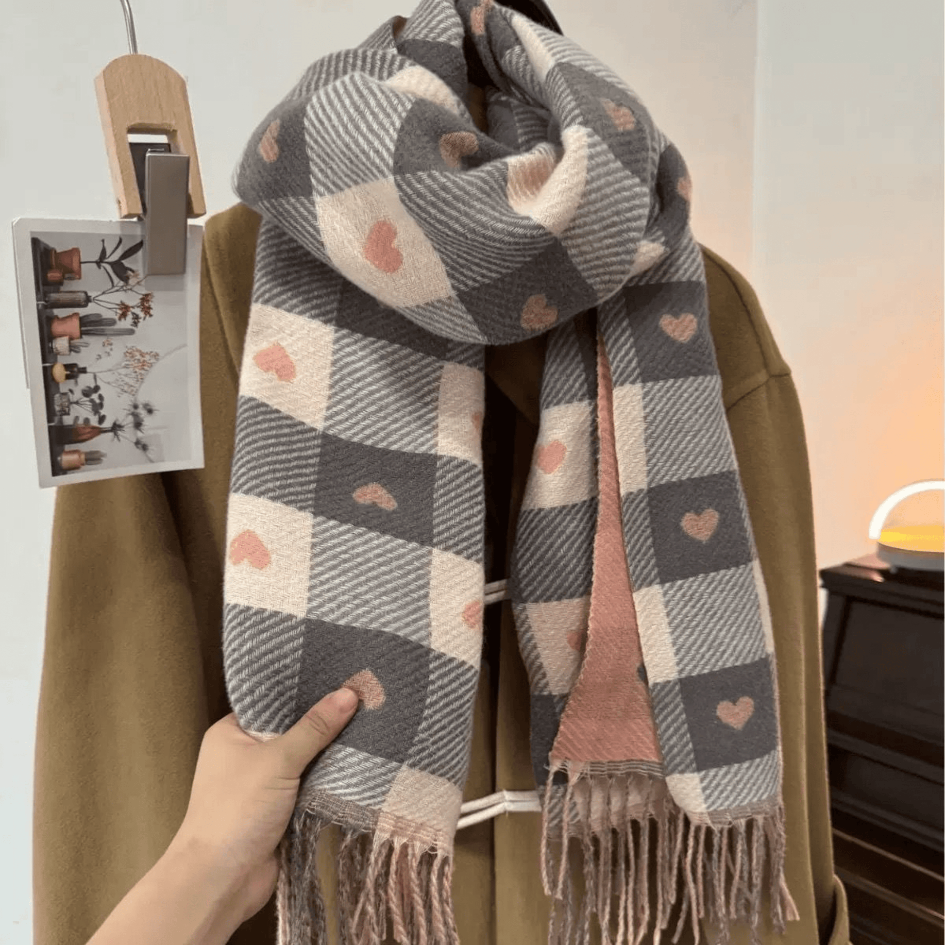Reversible plaid scarf with tassels, featuring a lightweight and cozy design, made from a soft fabric blend, perfect for winter styling. 3