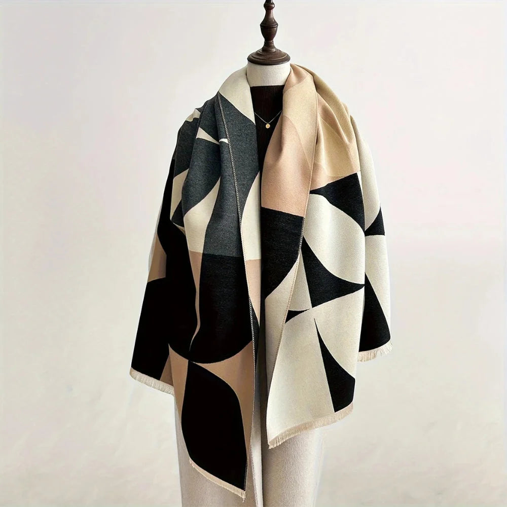 Reversible wrap scarf made from soft microfiber blend, featuring a lightweight design perfect for fall and winter styling. 0