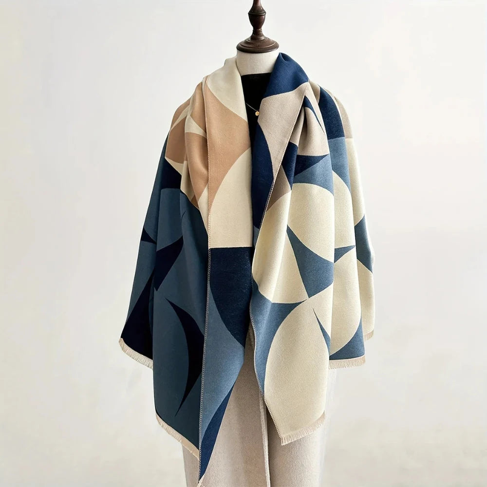 Reversible wrap scarf made from soft microfiber blend, featuring a lightweight design perfect for fall and winter styling. 4