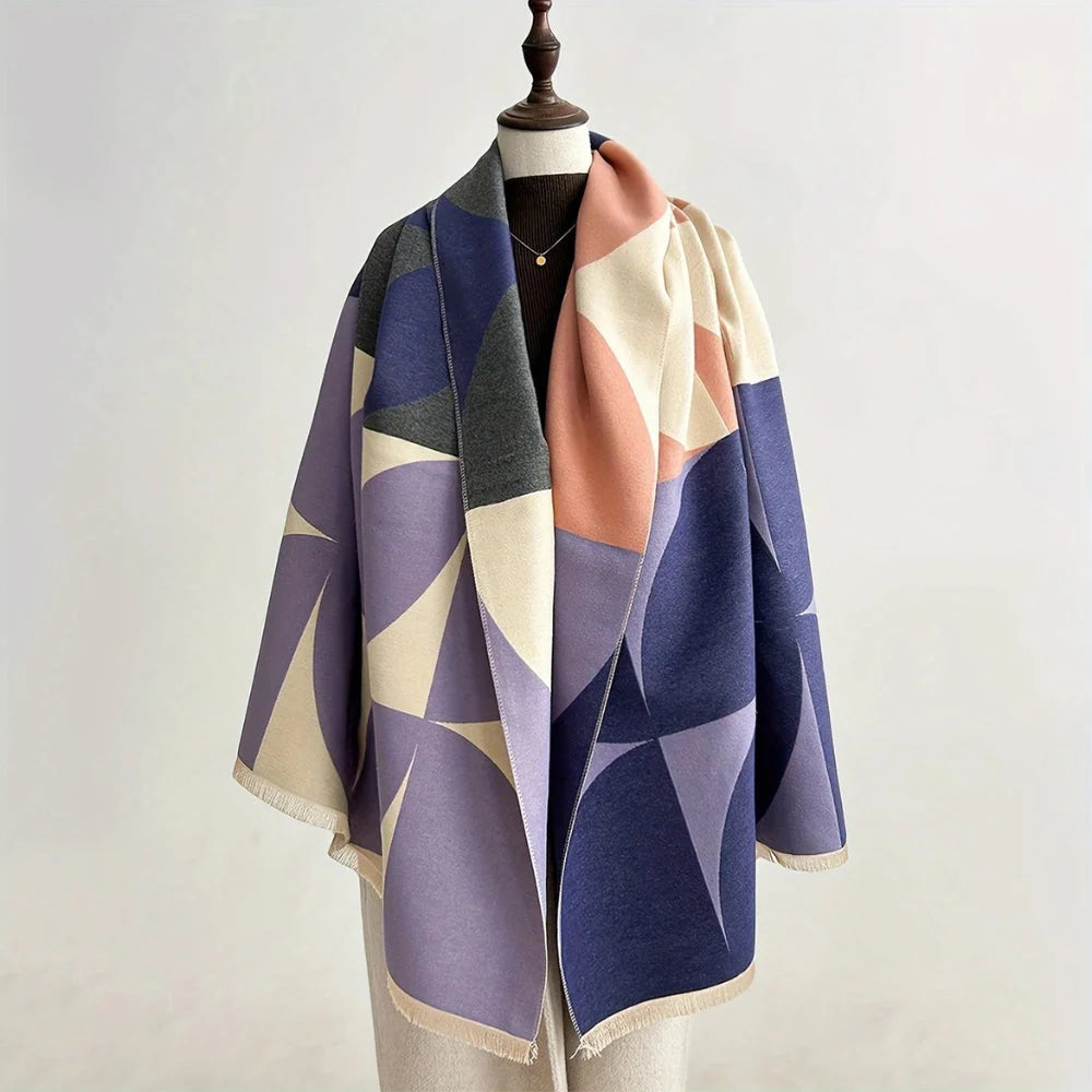 Reversible wrap scarf made from soft microfiber blend, featuring a lightweight design perfect for fall and winter styling. 6