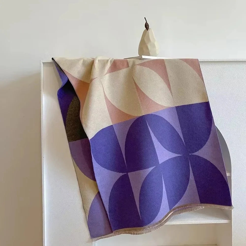 Reversible wrap scarf made from soft microfiber blend, featuring a lightweight design perfect for fall and winter styling. 8