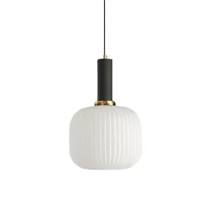 Ribbed glass pendant lights featuring a modern metal tube fitting, providing a warm ambient glow ideal for kitchen and dining spaces. 10