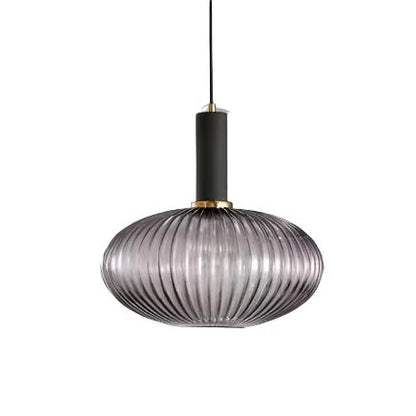 Ribbed glass pendant lights featuring a modern metal tube fitting, providing a warm ambient glow ideal for kitchen and dining spaces. 13