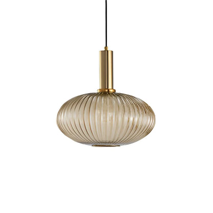 Ribbed glass pendant lights featuring a modern metal tube fitting, providing a warm ambient glow ideal for kitchen and dining spaces. 18