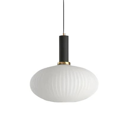 Ribbed glass pendant lights featuring a modern metal tube fitting, providing a warm ambient glow ideal for kitchen and dining spaces. 26