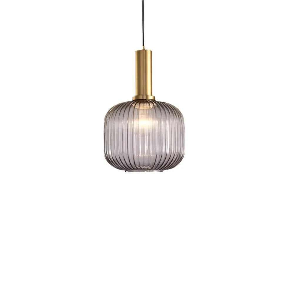 Ribbed glass pendant lights featuring a modern metal tube fitting, providing a warm ambient glow ideal for kitchen and dining spaces. 27