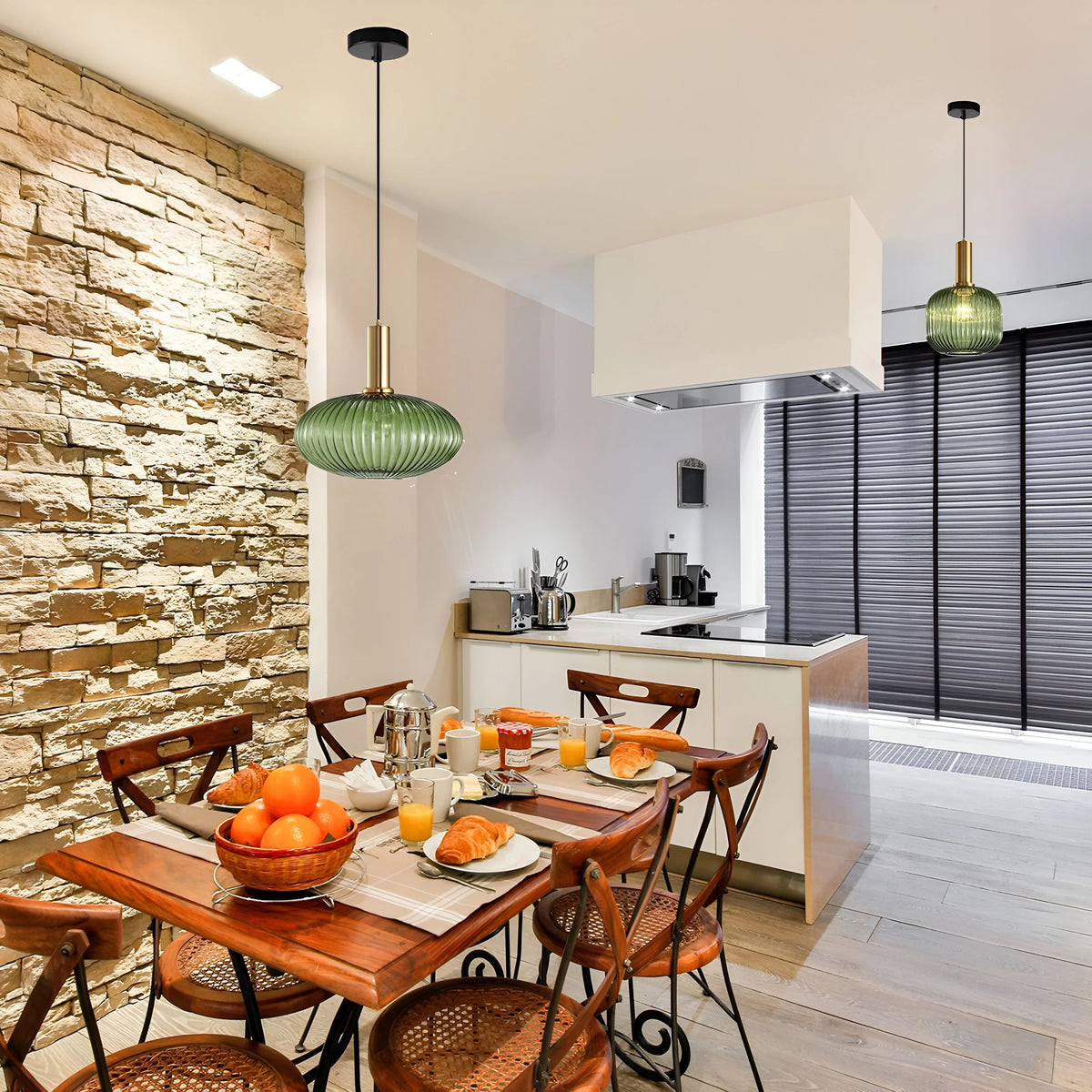 Ribbed glass pendant lights featuring a modern metal tube fitting, providing a warm ambient glow ideal for kitchen and dining spaces. 3