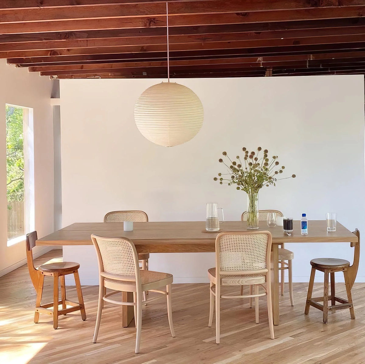 Rice Paper Pendant Lights with a ribbed shade designed for minimalist kitchen island lighting, showcasing a hardwired design available in multiple sizes. 5