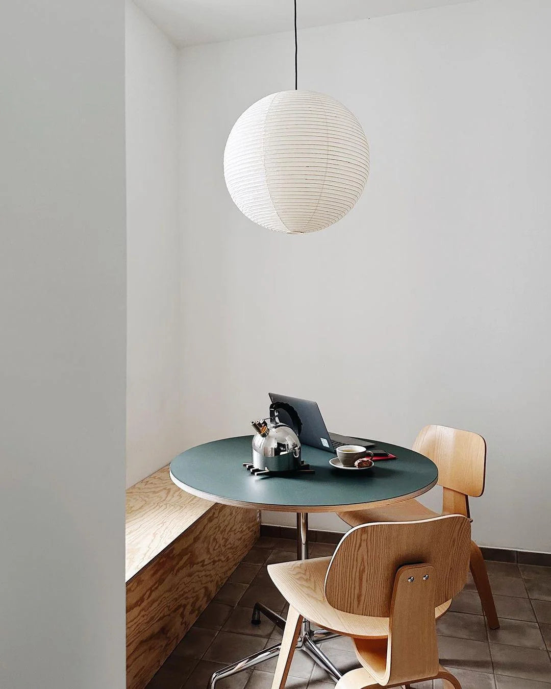 Rice Paper Pendant Lights with a ribbed shade designed for minimalist kitchen island lighting, showcasing a hardwired design available in multiple sizes. 6