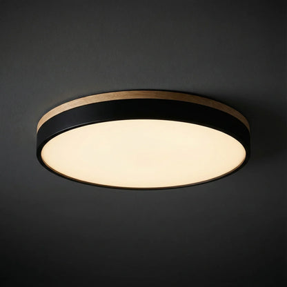 Round flush mount ceiling light featuring a sleek modern design, dimmable LED functionality, and an elegant wood trim, perfect for enhancing the ambiance of your 1