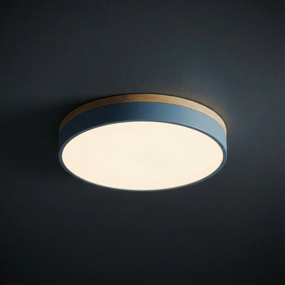 Round flush mount ceiling light featuring a sleek modern design, dimmable LED functionality, and an elegant wood trim, perfect for enhancing the ambiance of your 2