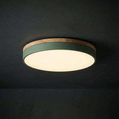 Round flush mount ceiling light featuring a sleek modern design, dimmable LED functionality, and an elegant wood trim, perfect for enhancing the ambiance of your 3