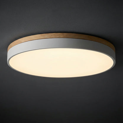 Round flush mount ceiling light featuring a sleek modern design, dimmable LED functionality, and an elegant wood trim, perfect for enhancing the ambiance of your 4