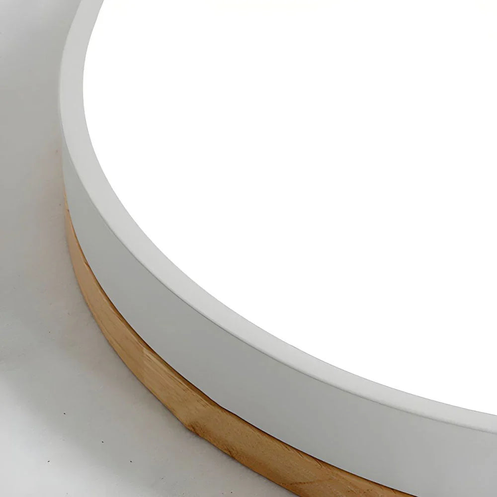 Round flush mount ceiling light featuring a sleek modern design, dimmable LED functionality, and an elegant wood trim, perfect for enhancing the ambiance of your 8