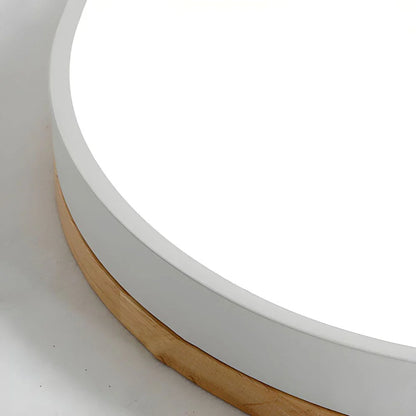 Round flush mount ceiling light featuring a sleek modern design, dimmable LED functionality, and an elegant wood trim, perfect for enhancing the ambiance of your 8