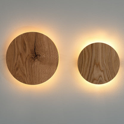Round Oak Wall Light featuring Soft Indirect Lighting in a Minimalist Scandinavian Design, available in 22cm and 28cm diameter options. 3