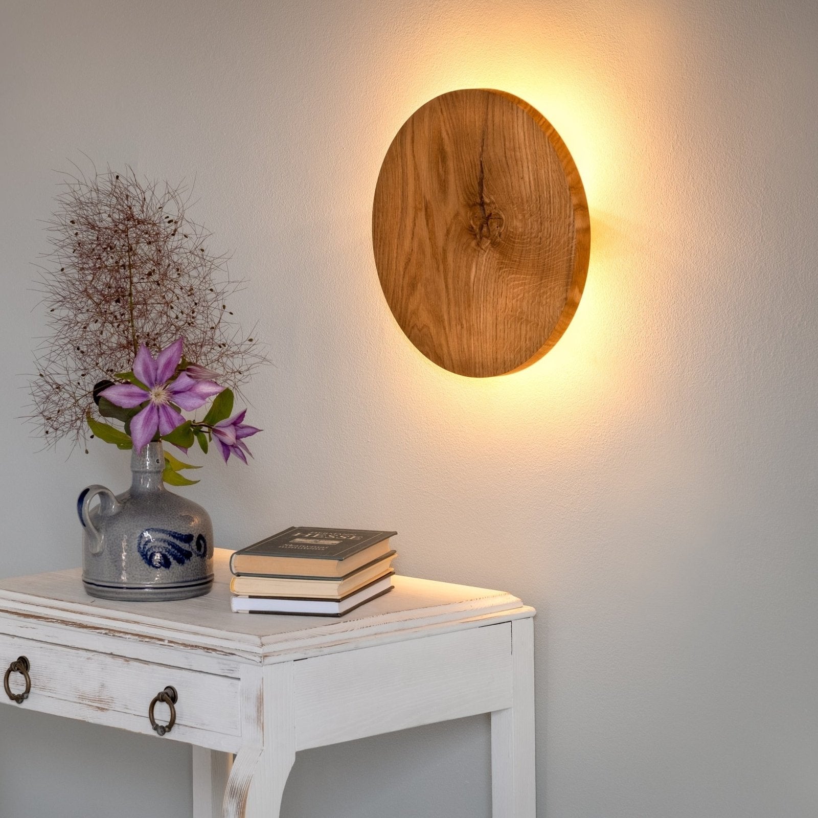Round Oak Wall Light featuring Soft Indirect Lighting in a Minimalist Scandinavian Design, available in 22cm and 28cm diameter options. 4