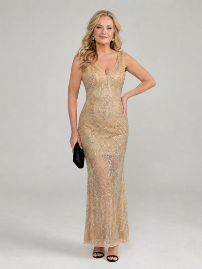 Sequin midi dress featuring sheer panels and a V neckline, designed for elegant evening wear in lightweight mesh fabric. 0