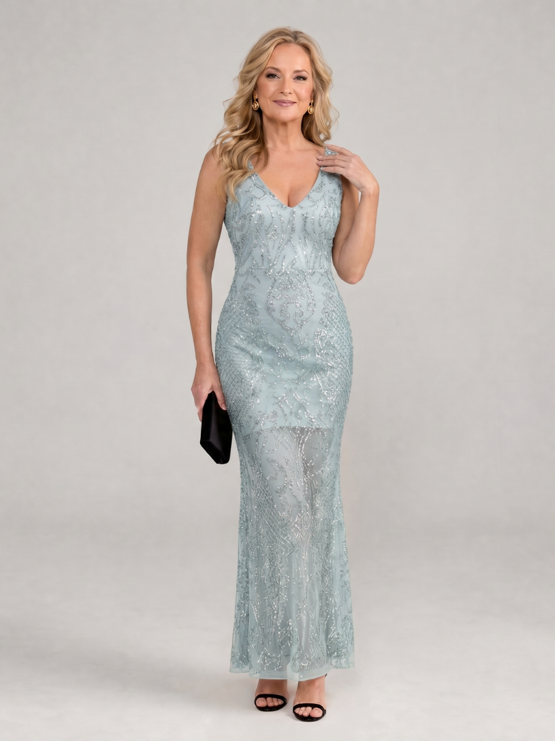 Sequin midi dress featuring sheer panels and a V neckline, designed for elegant evening wear in lightweight mesh fabric. 6