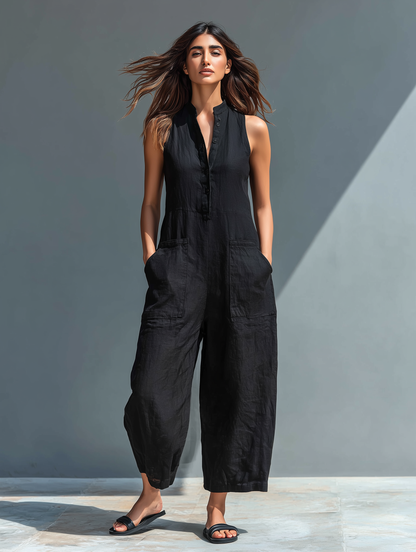 Sleeveless jumpsuit with a mandarin collar made from lightweight, breathable fabric, perfect for an elegant and stylish look. 0