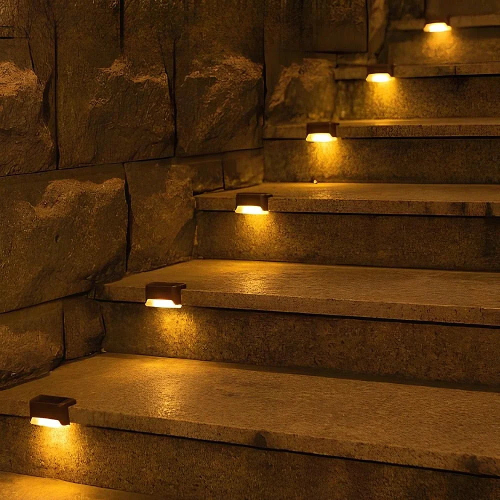 Solar step lights for outdoor use, featuring a compact design in brown or black housing, sold in an 8 pack, ideal for illuminating pathways and enhancing 1
