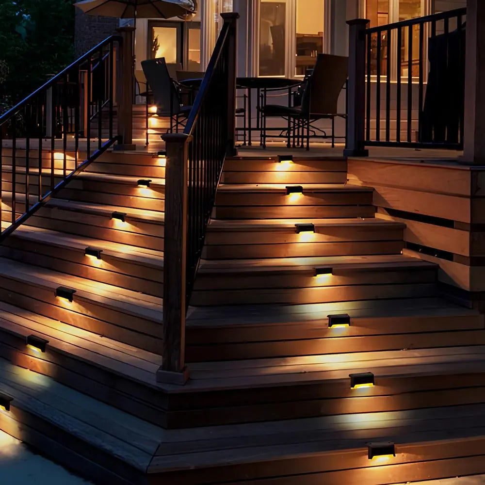 Solar step lights for outdoor use, featuring a compact design in brown or black housing, sold in an 8 pack, ideal for illuminating pathways and enhancing 6