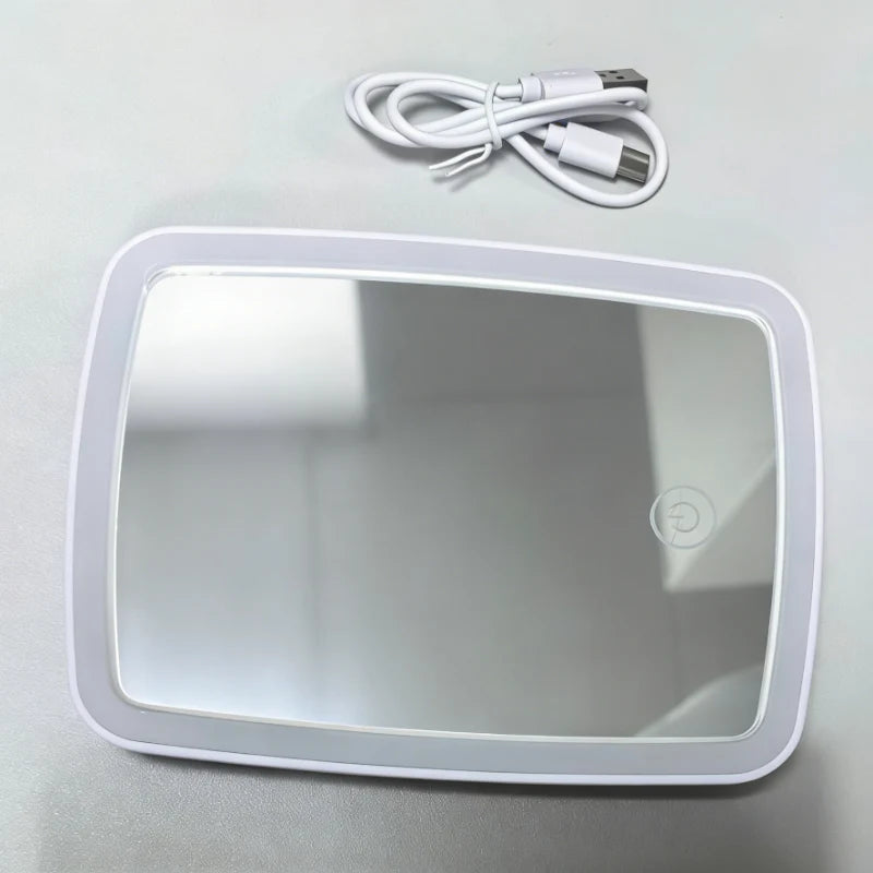 Tabletop makeup mirror featuring touch dimming and three color lighting options, designed for portable use with USB power, perfect for flawless makeup application. 1