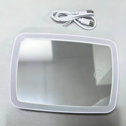 Tabletop makeup mirror featuring touch dimming and three color lighting options, designed for portable use with USB power, perfect for flawless makeup application. 1