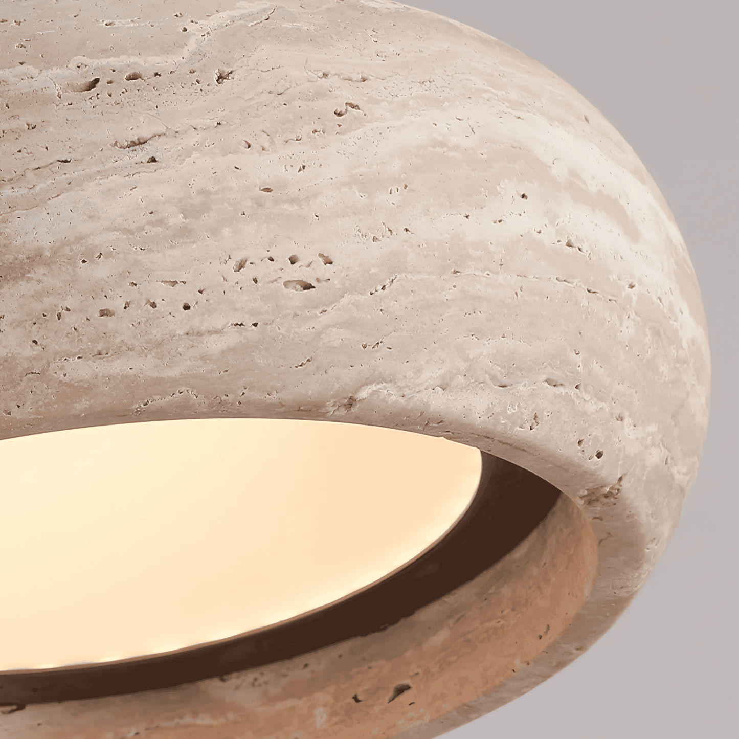 Travertine pendant light featuring a natural stone design and dimmable LED functionality, ideal for modern home decor. 3