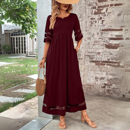 Tummy-smoothing midi dress featuring an empire waist and flowing skirt, designed for women with long sleeves in a classic white color. 4