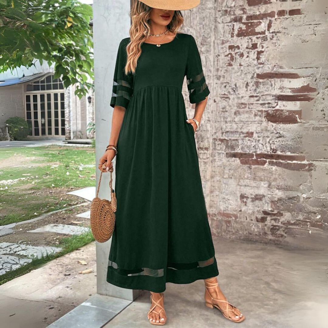 Tummy-smoothing midi dress featuring an empire waist and flowing skirt, designed for women with long sleeves in a classic white color. 5
