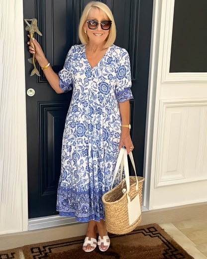 V-Neck Floral Maxi Dress featuring a relaxed fit, crafted from soft breathable fabric, perfect for summer wear. 0