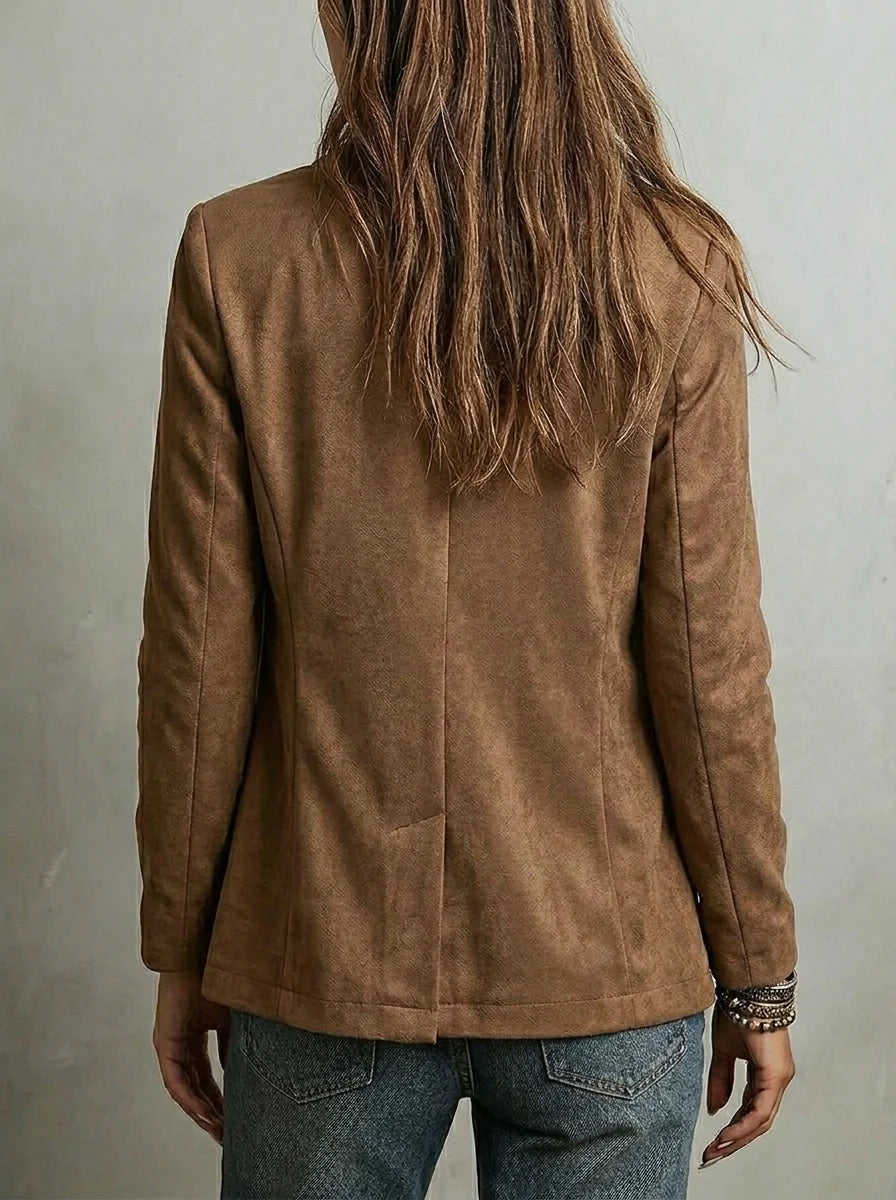 Vintage blazer jacket featuring contrast stitching, showcasing a minimalist design in neutral tones, perfect for stylish, versatile outfits. 1