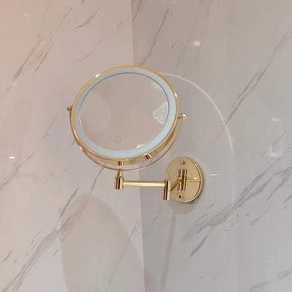 Wall mounted makeup mirror with LED light and magnification in a gold stainless steel finish, perfect for enhancing your beauty routine. 3