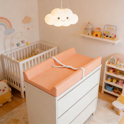 Waterproof baby changing pad with cushioned contoured support, featuring a neutral design ideal for modern nurseries. 6