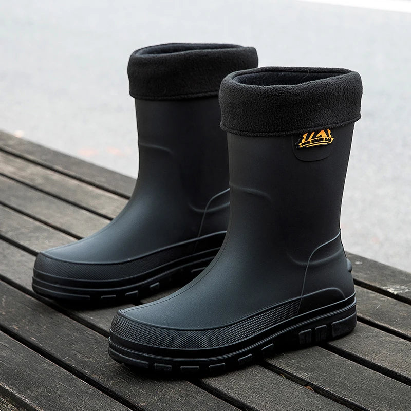 Waterproof rain boots for men featuring a slip-resistant sole and mid-calf outdoor design, ideal for wet conditions and outdoor activities. 3