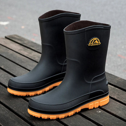 Waterproof rain boots for men featuring a slip-resistant sole and mid-calf outdoor design, ideal for wet conditions and outdoor activities. 6