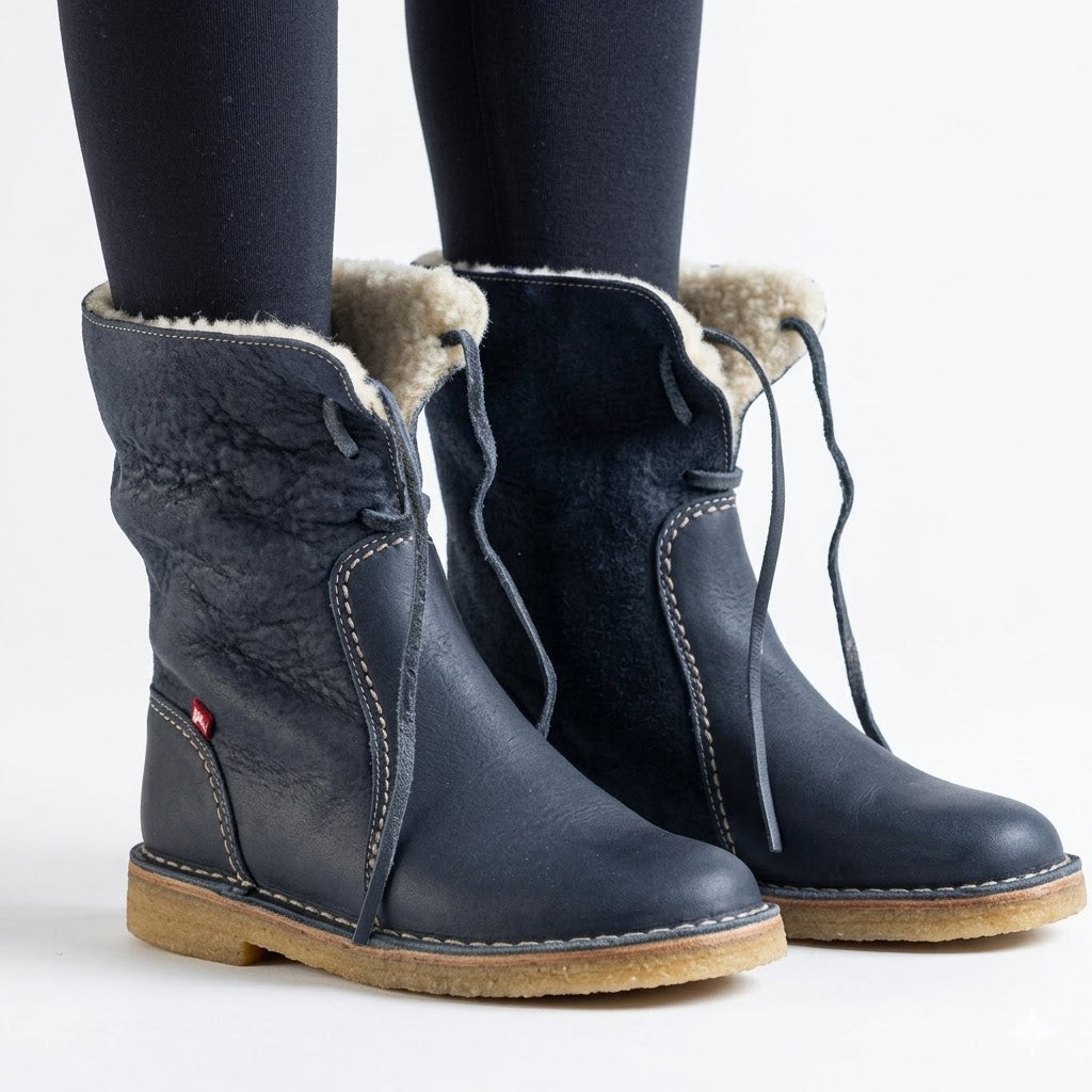 Waterproof winter boots for women featuring a cozy fur-lined interior and a convenient slip-on design, perfect for cold weather protection and comfort. 0