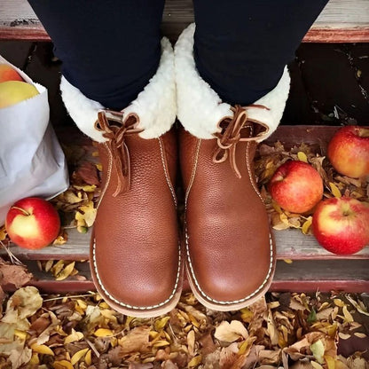 Waterproof winter boots for women featuring a cozy fur-lined interior and a convenient slip-on design, perfect for cold weather protection and comfort. 8