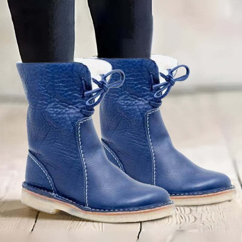 Waterproof winter boots for women featuring a cozy fur-lined interior and a convenient slip-on design, perfect for cold weather protection and comfort. 9