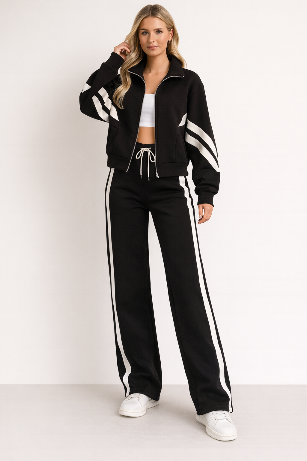 Women's 2-Piece Training Set featuring a stylish zipper jacket and wide leg pants, designed in a modern sporty style with contrasting stripes for a chic workout 1