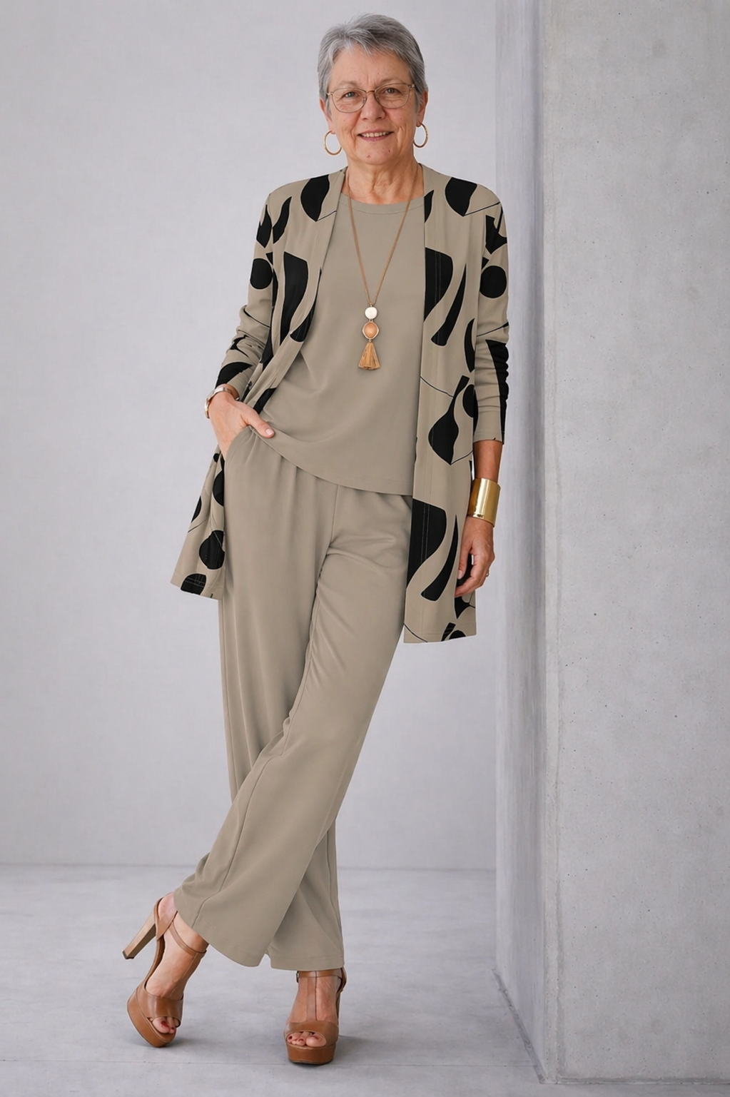 Women's 3-piece set featuring a relaxed fit cardigan, long sleeve top, and wide-leg trousers in earthy tones, perfect for casual elegance and comfort. 0